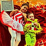 child, children, christmas, holiday, festive, costume, tights, red_blanket, christmas_lights, smiling, baby, girl, infant, floor, sign, happy, cute, celebration, decoration, portrait