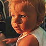 Mïa a rejoint le concours — aidez-le/la à gagner de superbes lots ! toddler, child, portrait, close_up, sunlight, hair, blue_eyes, white_shirt, skin, face, cute, indoor, baby, expression, person, young_child, warm_light, curious, small_earring, casual_wear