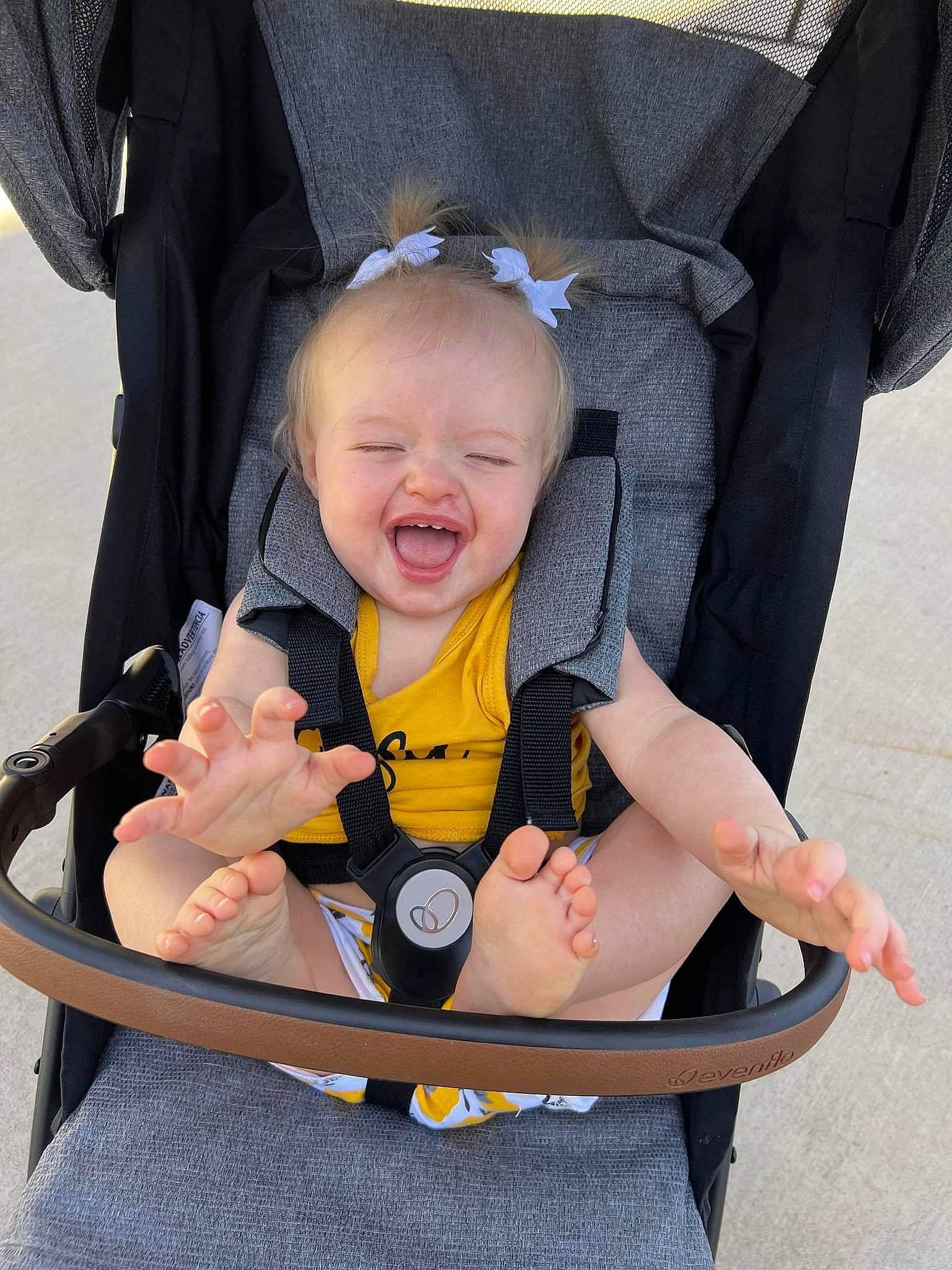 Cheyenne is registered to the contest to win money with this photo: auto_part, baby, baby_carriage, baby_products, baby_toddler_clothing, car_seat, chair, cheek, child, comfort, eye, face, fashion_accessory, happy, head, lap, person, product, sitting, smile