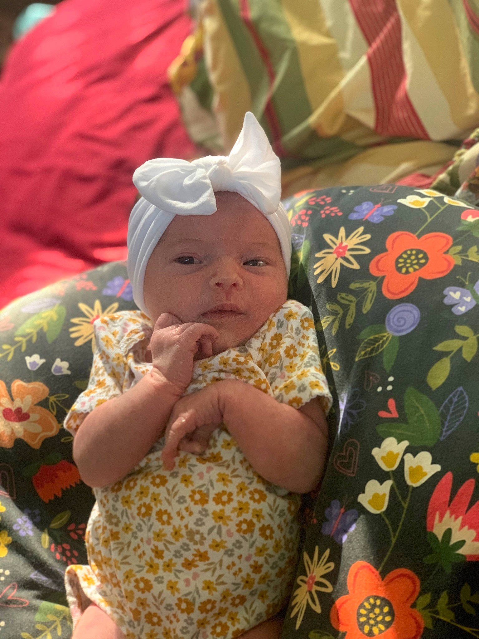 Lakelynn is registered to the contest to win money with this photo: baby, baby_products, baby_toddler_clothing, cheek, child, day_dress, event, fun, grass, happy, hat, headgear, headwear, linens, pattern, person, sitting, sun_hat, textile, toddler
