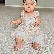 Nyamat joined the competition — help win amazing prizes! baby, child, infant, carpet, dress, headband, bracelet, floor, sitting, indoor, portrait, cute, young, person, fashion, accessories, expression, looking, skin, foot