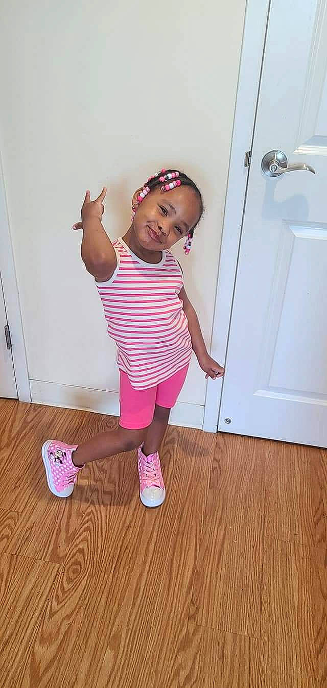 Janae joined the competition — help win amazing prizes! baby, child, floor, flooring, joint, joy, leg, person, pink, play, shoe, shoulder, skin, standing, toddler, wood