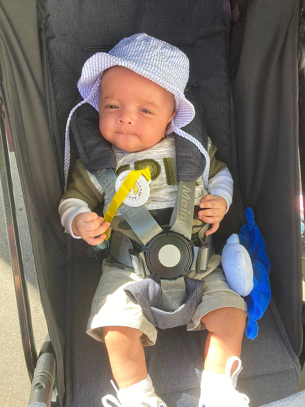 Naïl participe au concours pour gagner de l'argent avec cette photo : baby, baby_carriage, baby_products, child, headwear, person, product, skin, smile, toddler, vacation