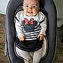 baby, infant, smiling, sitting, baby_rocker, dress, minnie_mouse, shoes, white_tights, cute, happy, indoor, wooden_floor, child, person, clothing, seat, furniture, cute_baby, portrait