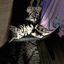 animal, carpet, cat, chair, cozy, domestic, feline, fur_pattern, indoor, kitten, nap, paw, pet, purple_cloth, relaxed, shadow, sleeping, soft_light, striped_fur, whiskers