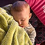 Ryder is registered to the contest to win money with this photo: baby, infant, child, sleeping, blanket, plush_blanket, bouncer, baby_seat, pink, portrait, closeup, cozy, indoor, eyelashes, hair, face, closed_eyes, mouth, clothing, peaceful