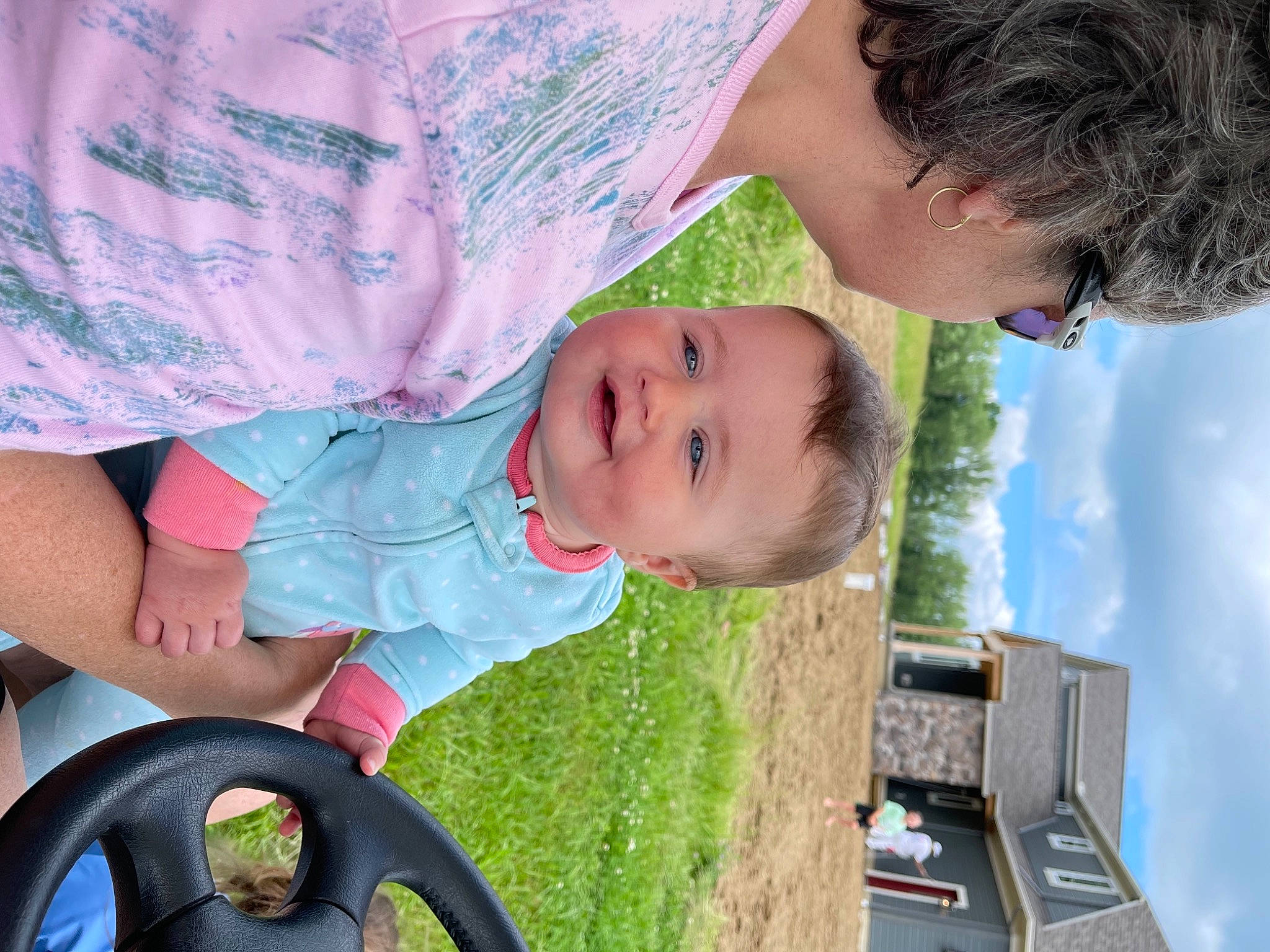 Phoenix is registered to the contest to win money with this photo: baby, baby_toddler_clothing, child, cloud, daytime, fun, grass, green, happy, head, leisure, people, person, photograph, skin, smile, snapshot, summer, toddler, white