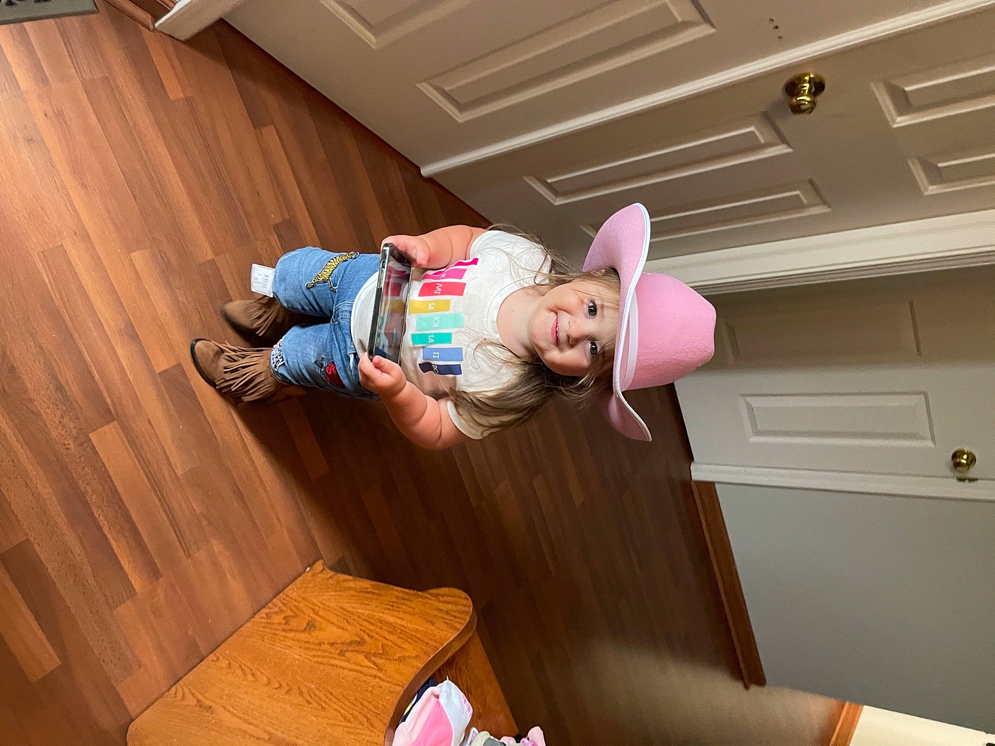 Adrian is registered to the contest to win money with this photo: baby_toddler_clothing, ceiling, child, comfort, flooring, fun, happy, hardwood, headwear, joy, laminate_flooring, leisure, person, room, smile, sock, thigh, thumb, toddler, varnish