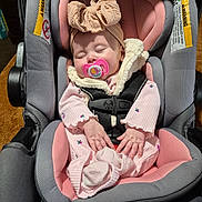 Lydia joined the competition — help win amazing prizes! baby, bonnet, car, clothing, coat, crib, cushion, face, furniture, hat, head, homedecor, infantbed, jacket, person, photography, portrait, sleeping, transportation, vehicle