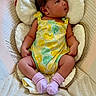 Azriel is registered to the contest to win money with this photo: baby, baby_seat, carpet, child, citrus_pattern, comfort, cute, fisher_price, indoor, infant, infant_clothing, looking_sideways, newborn, plush, portrait, relaxing, romper, small, socks, soft