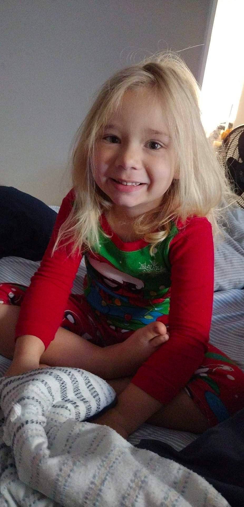 Kenzie Grace joined the competition — help win amazing prizes! cheek, comfort, eye, face, facial_expression, hair, hairstyle, happy, head, iris, joy, knee, lap, leg, person, pink, skin, sleeve, smile, sock