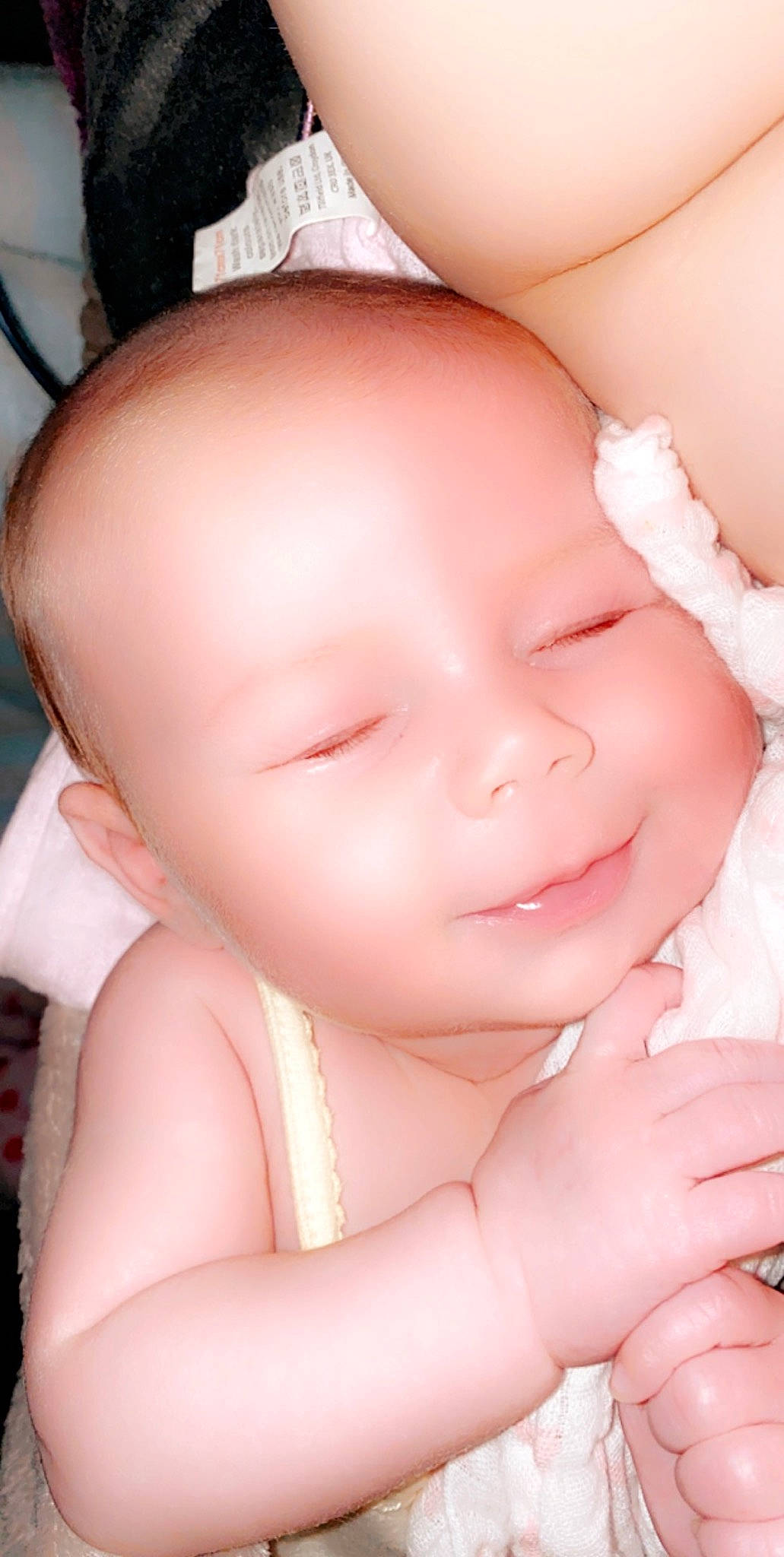 Lily-rose is registered to the contest to win money with this photo: baby, cheek, child, chin, face, forehead, hand, head, lip, mouth, neck, nose, person, pink, skin, toddler