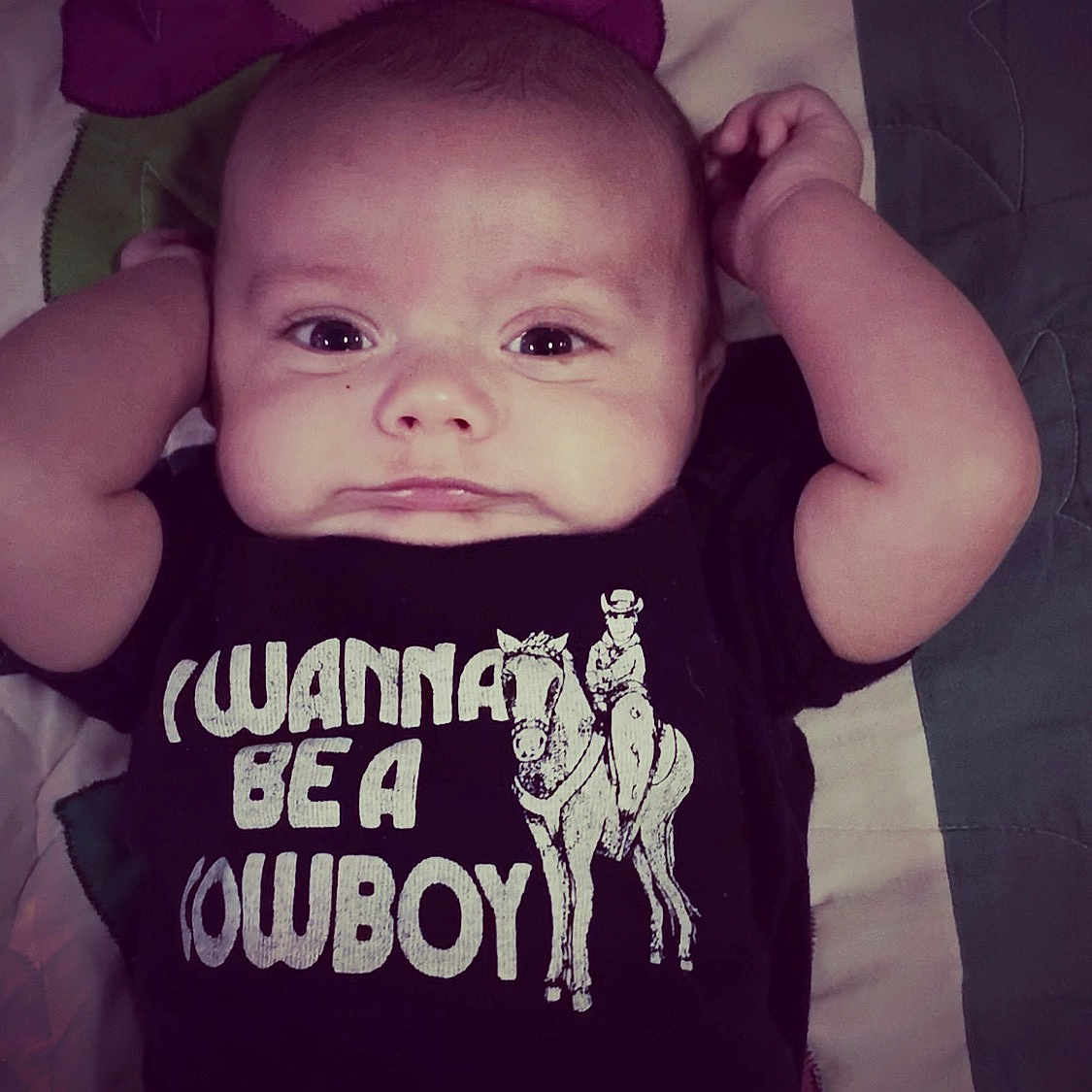 Holt is registered to the contest to win money with this photo: baby, baby_toddler_clothing, cheek, child, cool, face, facial_expression, forehead, hand, happy, head, human, lip, organ, person, product, sleeve, smile, t_shirt, toddler