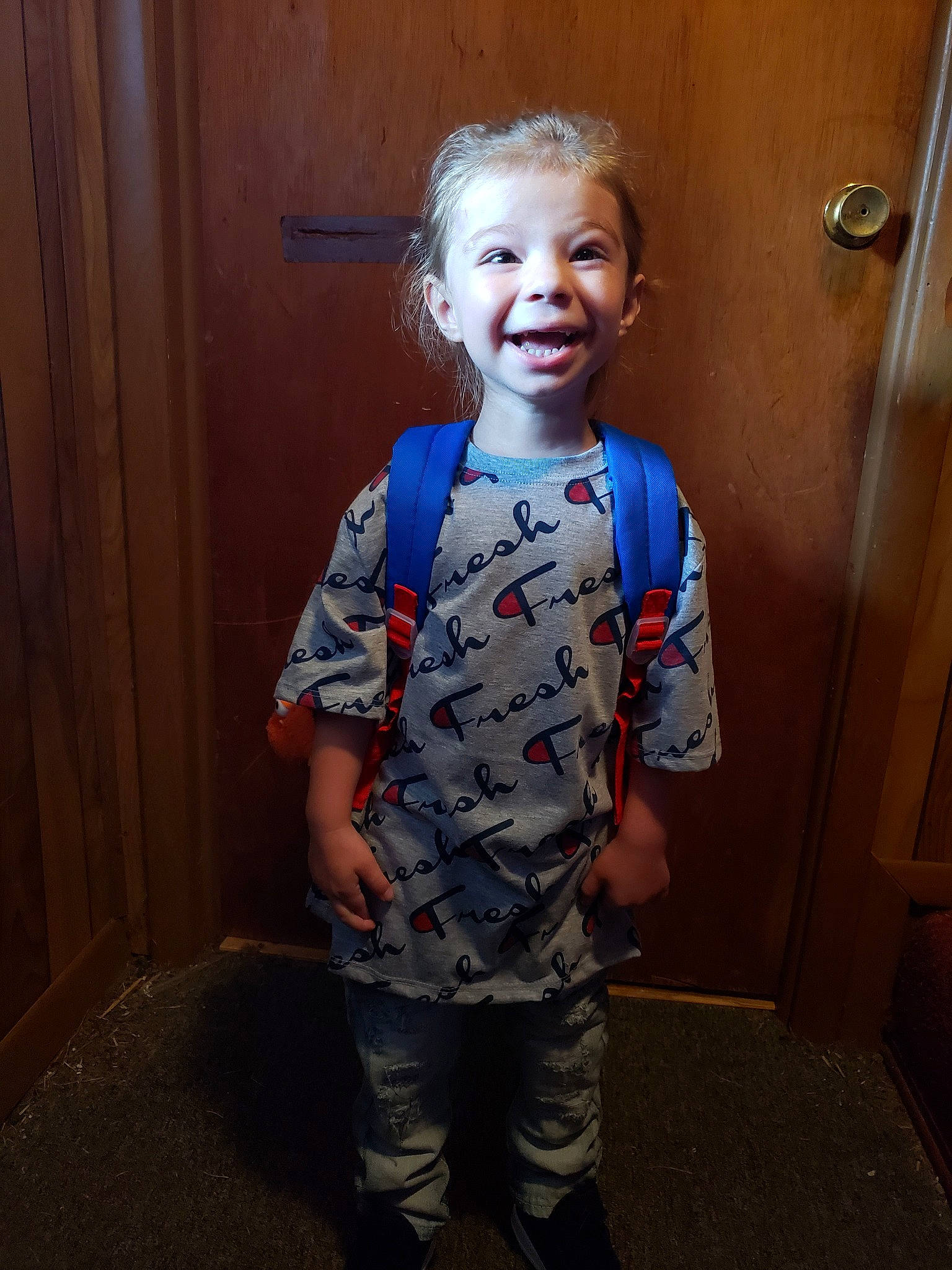 Juelz is registered to the contest to win money with this photo: cheek, child, head, nose, person, sleeve, smile, standing, toddler