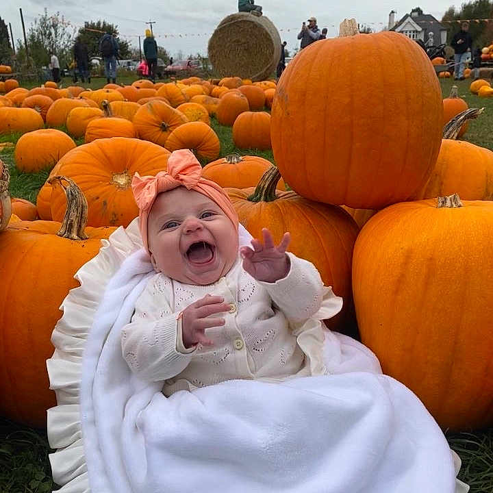 Danni-Rae is registered to the contest to win money with this photo: autumn, baby, blanket, celebration, child, cloudy_sky, cute, fall, festival, grass, happy, hay_bale, headband, nature, orange, outdoor, people, pumpkin, pumpkin_patch, smiling