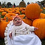 Danni-Rae joined the competition — help win amazing prizes! baby, pumpkin, pumpkin_patch, blanket, headband, smiling, outdoor, grass, hay_bale, autumn, cloudy_sky, people, festival, nature, fall, child, cute, celebration, orange, cozy