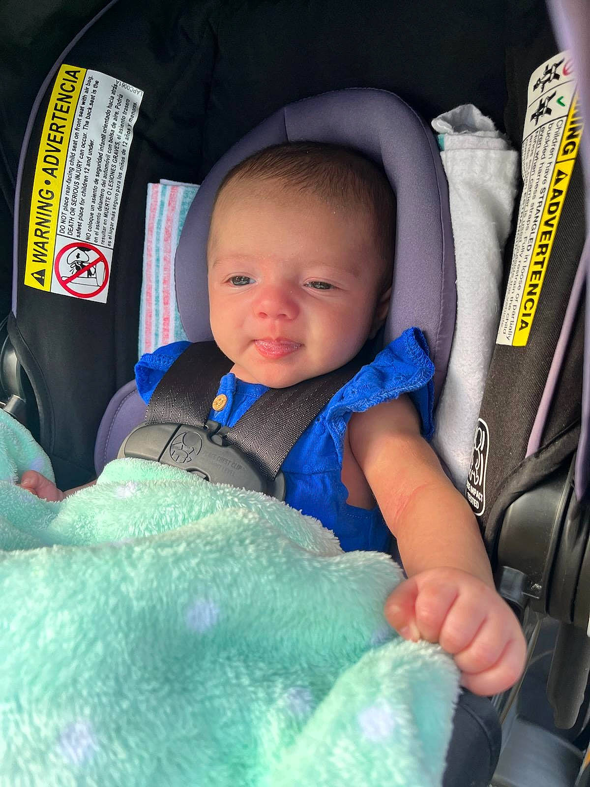 Alani is registered to the contest to win money with this photo: auto_part, baby, baby_carriage, baby_in_car_seat, baby_products, baby_toddler_clothing, car_seat, child, comfort, electric_blue, eye, fashion_accessory, gesture, happy, infant_bed, person, seat_belt, sitting, smile, thumb