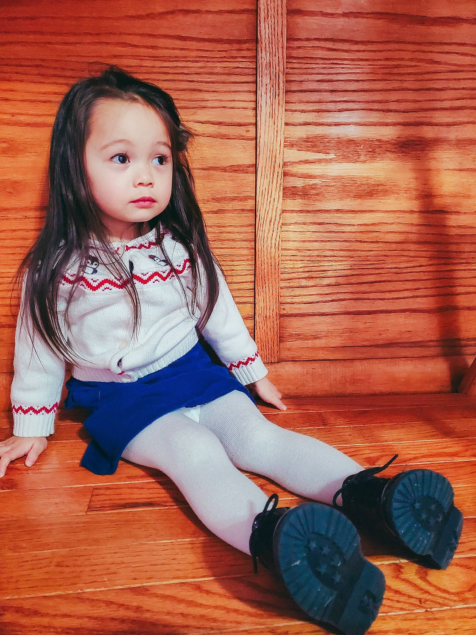 Aurora Christina is registered to the contest to win money with this photo: baby_toddler_clothing, black_hair, flash_photography, floor, flooring, happy, hardwood, human_leg, knee, leg, long_hair, person, shoe, shoulder, skin, sleeve, sneakers, standing, thigh, toddler