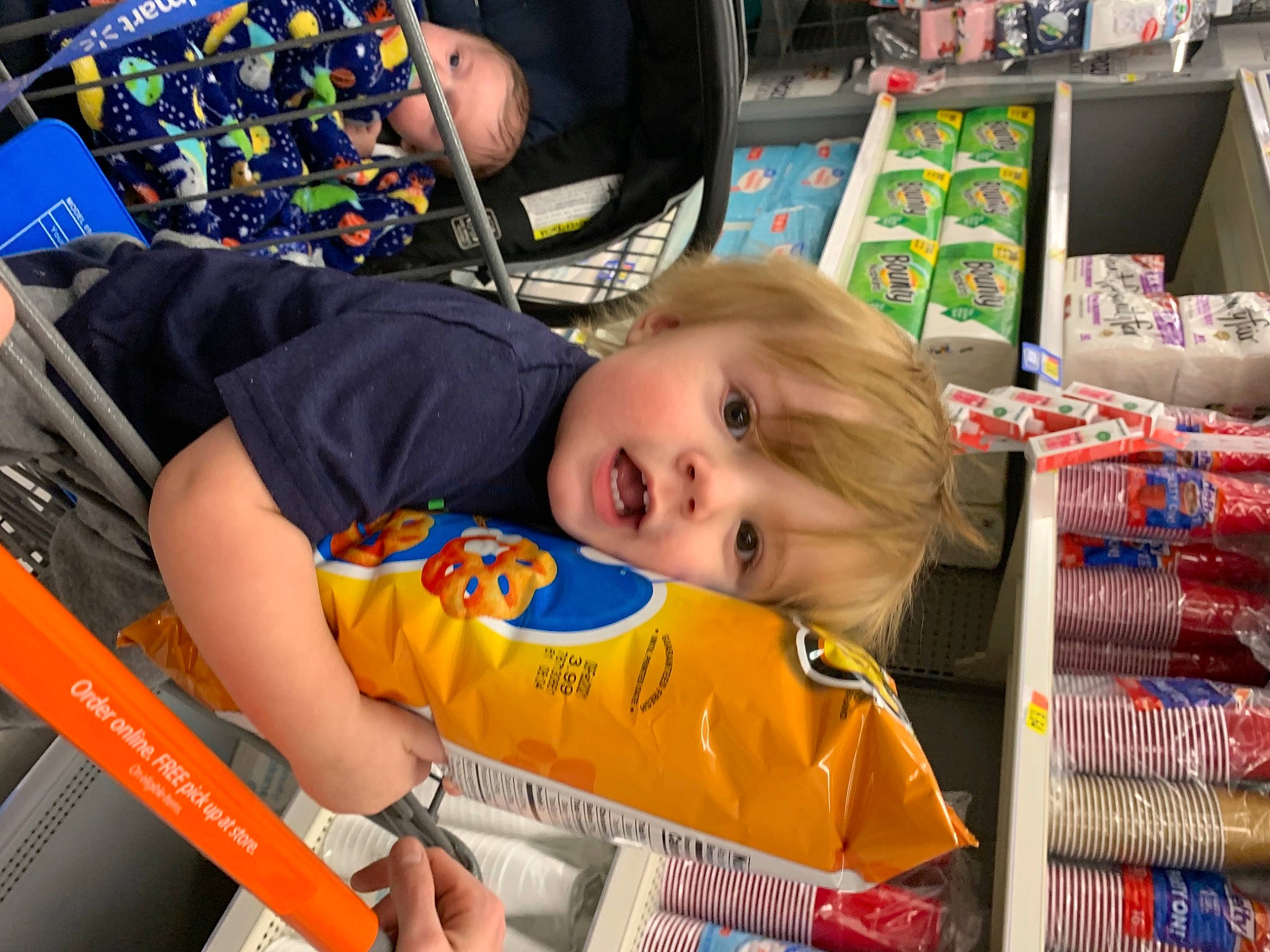 Huxley joined the competition — help win amazing prizes! baby, baby_products, baby_toddler_clothing, box, cart, person, plastic, product, shopping_cart