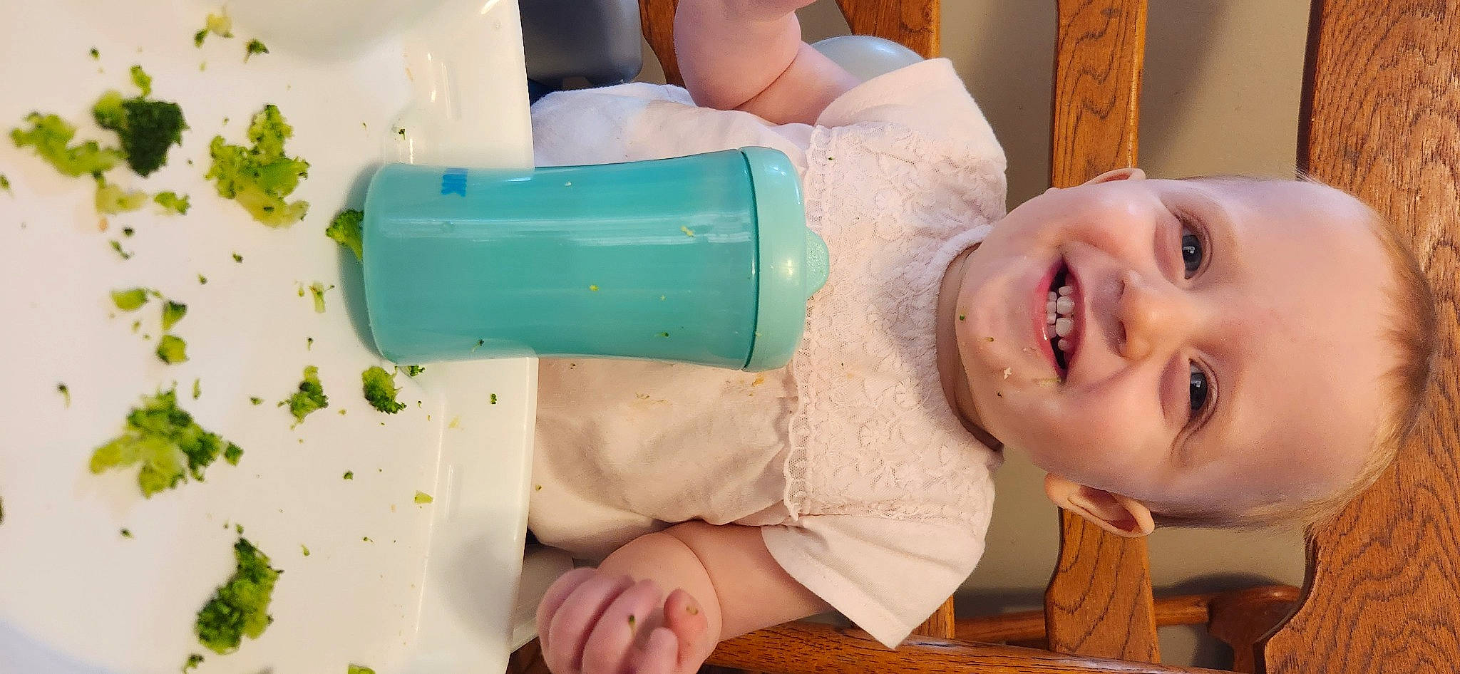 Clarissa joined the competition — help win amazing prizes! baby, baby_toddler_clothing, child, drink, drinking, drinkware, food, fun, green, happy, joy, leisure, person, plastic, plastic_bottle, room, skin, smile, table, tableware