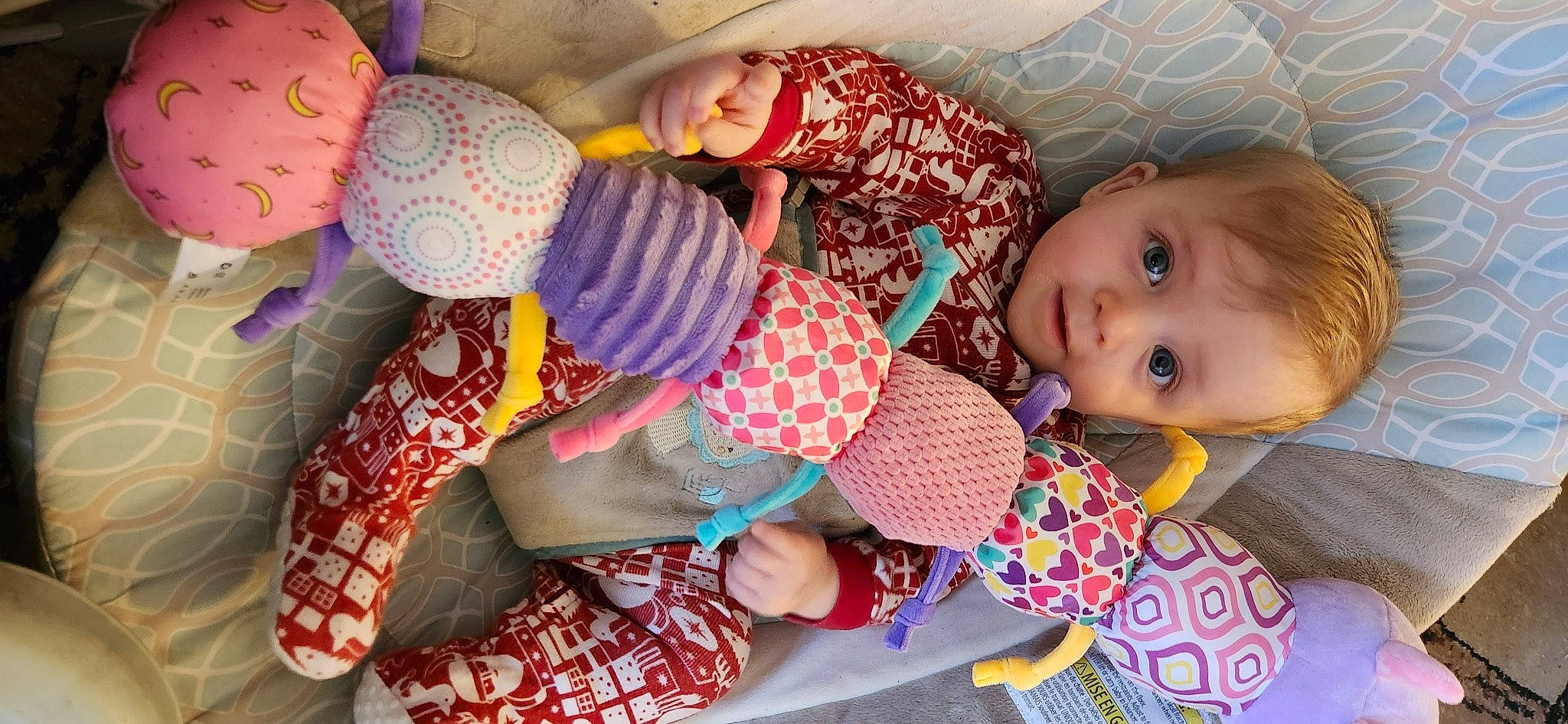 Kasandra is registered to the contest to win money with this photo: baby, baby_products, baby_toddler_clothing, cheek, child, comfort, design, fun, head, human_body, lap, linens, pattern, person, room, sitting, sleep, sock, textile, toddler