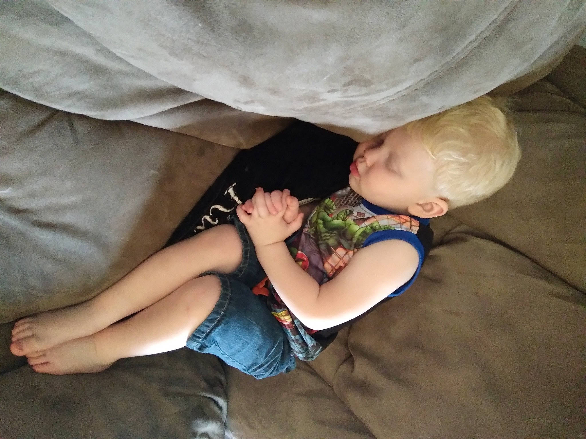 Weston is registered to the contest to win money with this photo: baby, baby_toddler_clothing, comfort, elbow, finger, flooring, foot, fun, gesture, human_body, human_leg, knee, lap, leg, person, sitting, sleeve, sock, thigh, toddler