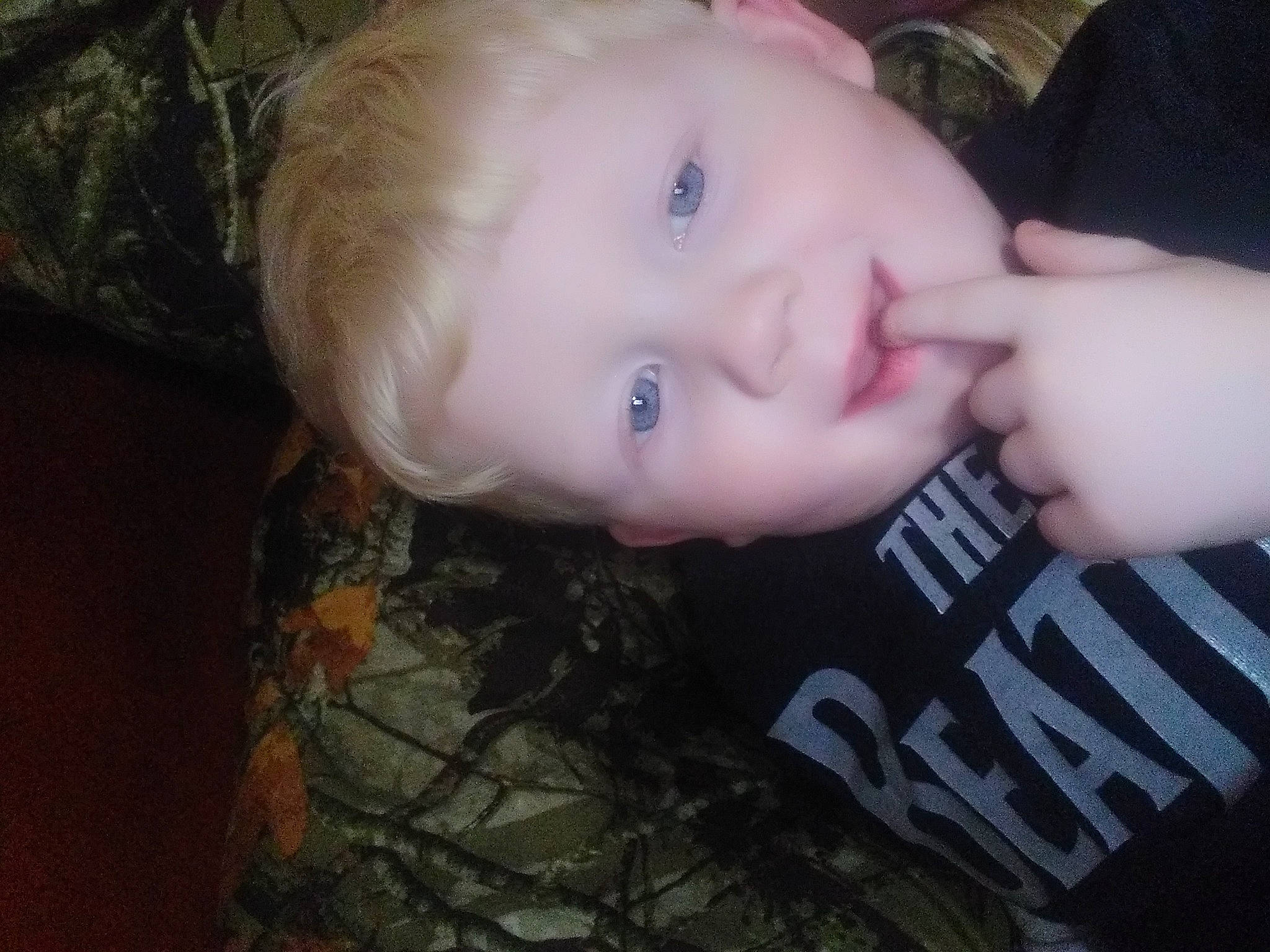 Weston is registered to the contest to win money with this photo: baby_toddler_clothing, cheek, ear, eye, eyebrow, eyelash, flash_photography, forehead, grass, happy, iris, jaw, lip, mouth, neck, nose, person, skin, smile, toddler