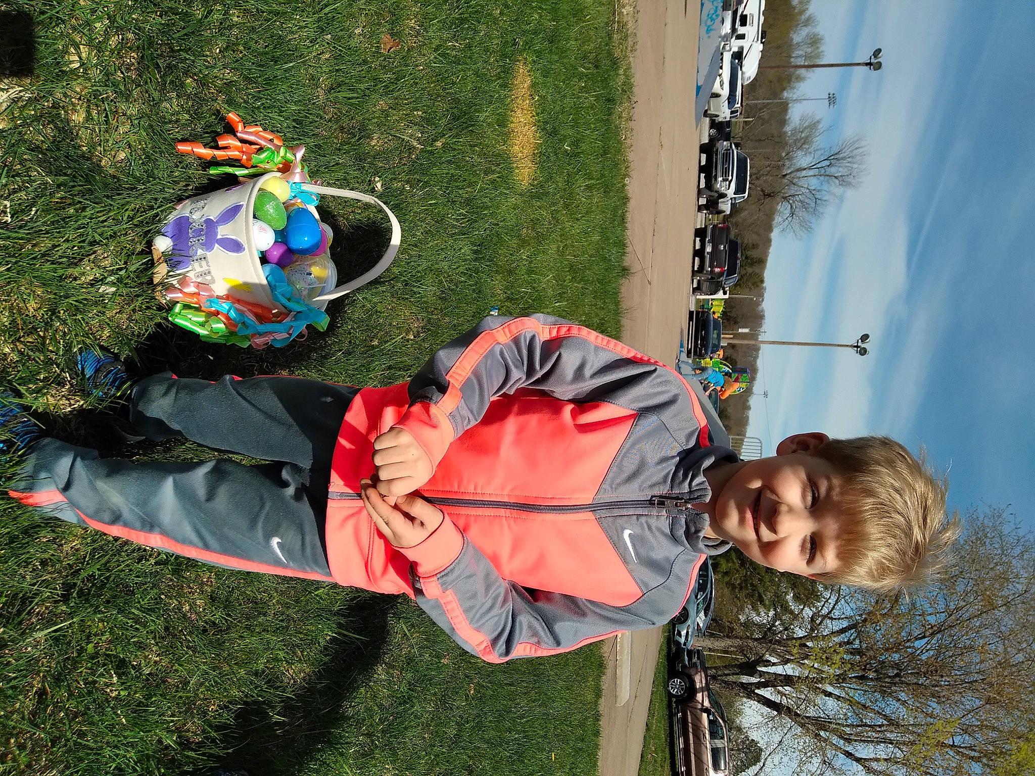 Tucker joined the competition — help win amazing prizes! carmine, child, cloud, fun, grass, happy, hat, joy, leisure, people_in_nature, person, plant, pole, recreation, sky, tree, world