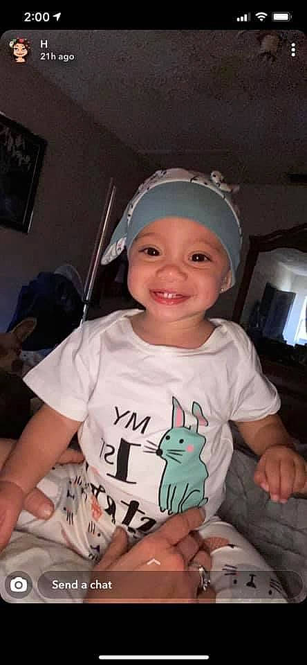 Kailani joined the competition — help win amazing prizes! baby, baby_toddler_clothing, cheek, cool, facial_expression, finger, hairstyle, hand, happy, head, headwear, joy, mammal, mouth, organ, person, pink, skin, sleeve, smile