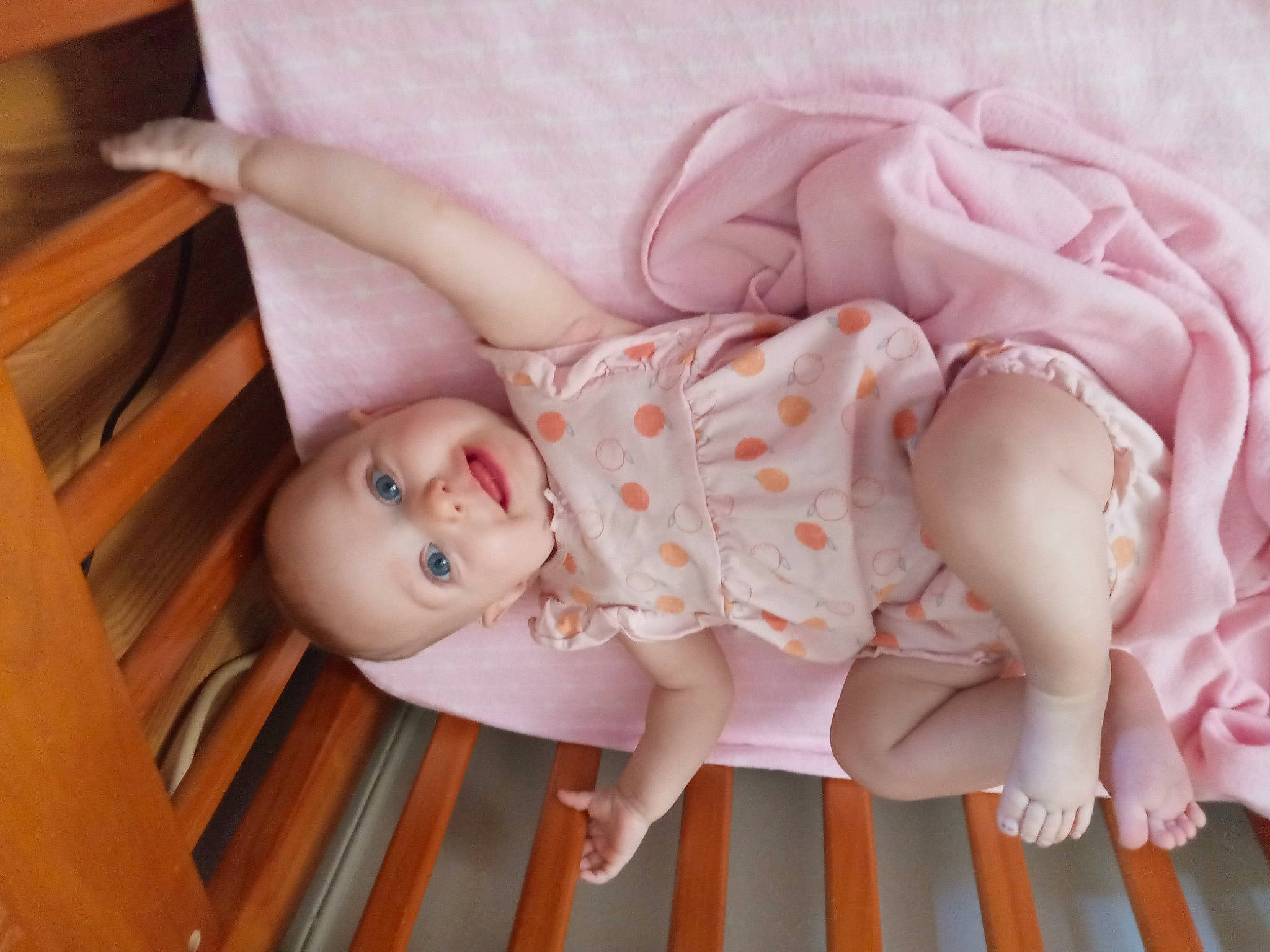 Khloe is registered to the contest to win money with this photo: baby, baby_products, baby_safety, baby_toddler_clothing, cheek, child, comfort, hand, human_body, iris, leg, linens, lip, person, pink, product, skin, sleeve, smile, toddler