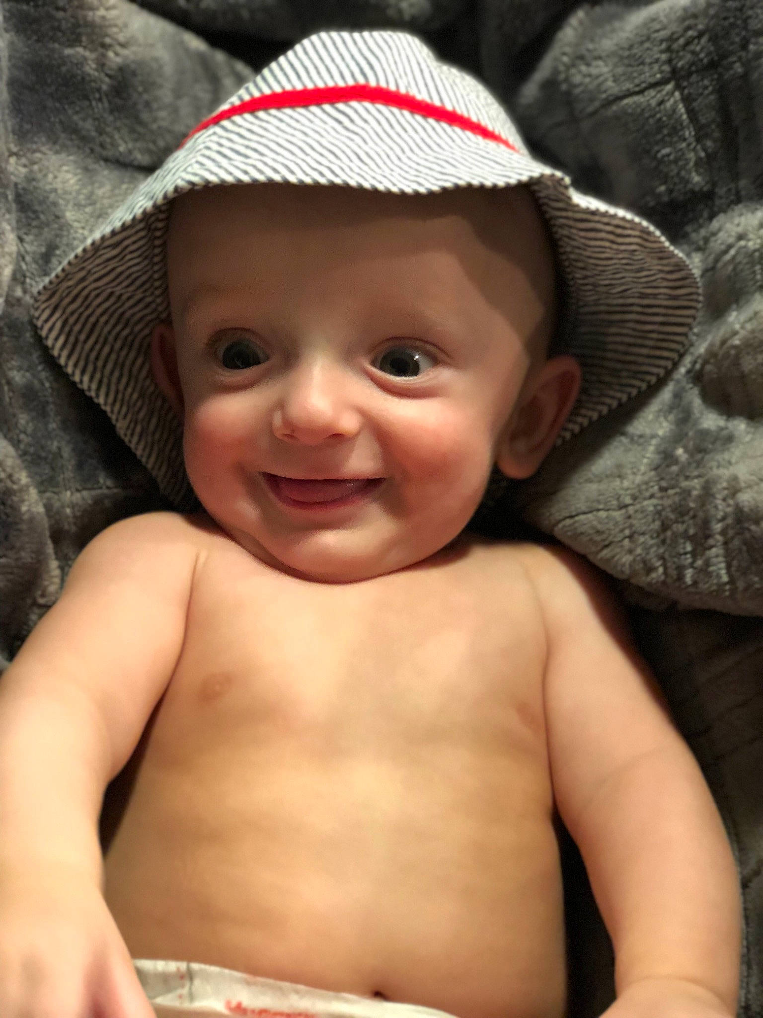 Will is registered to the contest to win money with this photo: baby, baby_products, cap, cheek, child, eye, face, hat, head, headgear, headwear, joy, lip, mouth, person, product, skin, smile, toddler