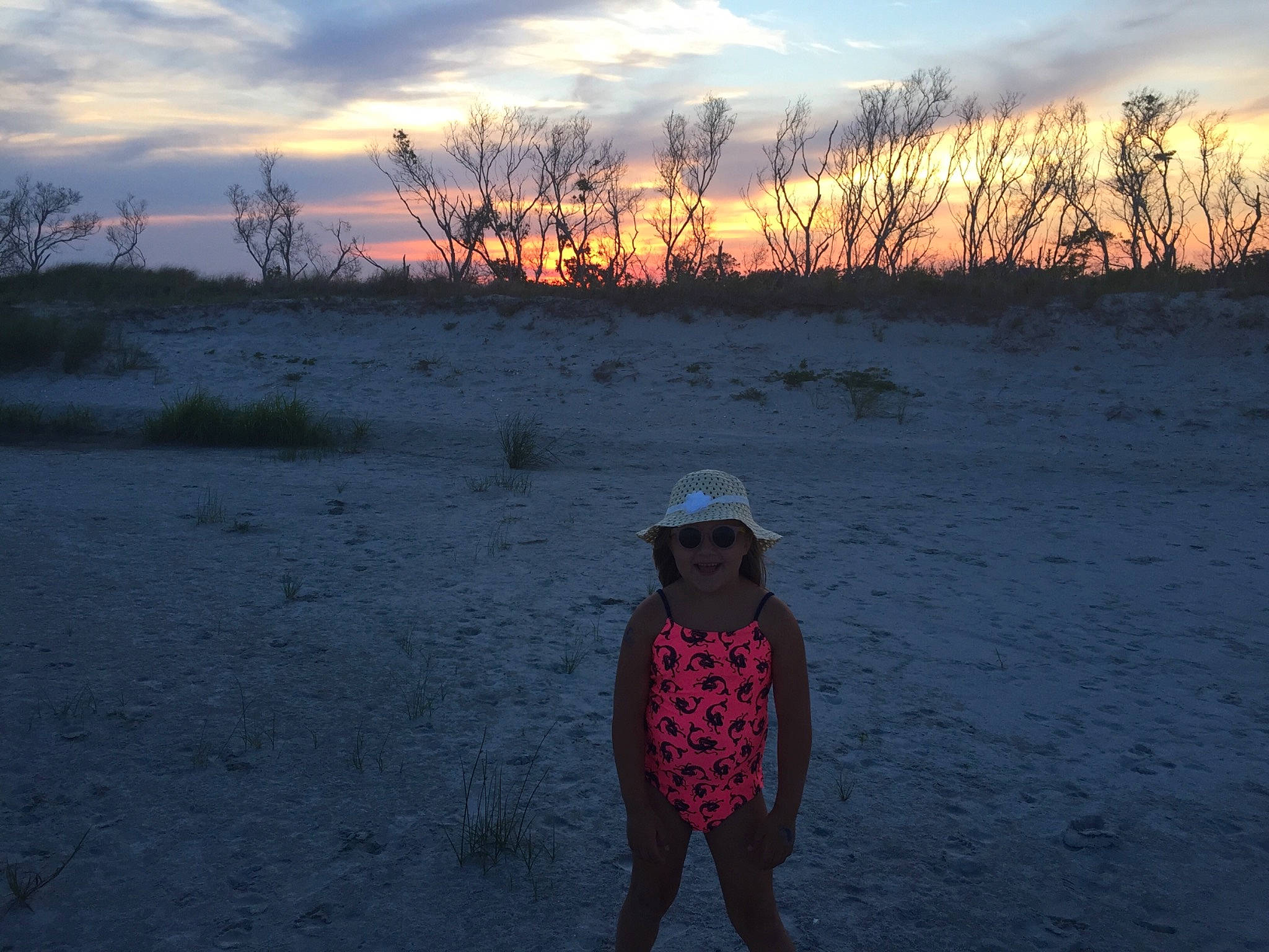 Lesleigh joined the competition — help win amazing prizes! afterglow, cloud, dusk, grass, happy, hat, headwear, horizon, joy, landscape, morning, natural_environment, natural_landscape, nature, people_in_nature, person, plant, red_sky_at_morning, sky, sunlight