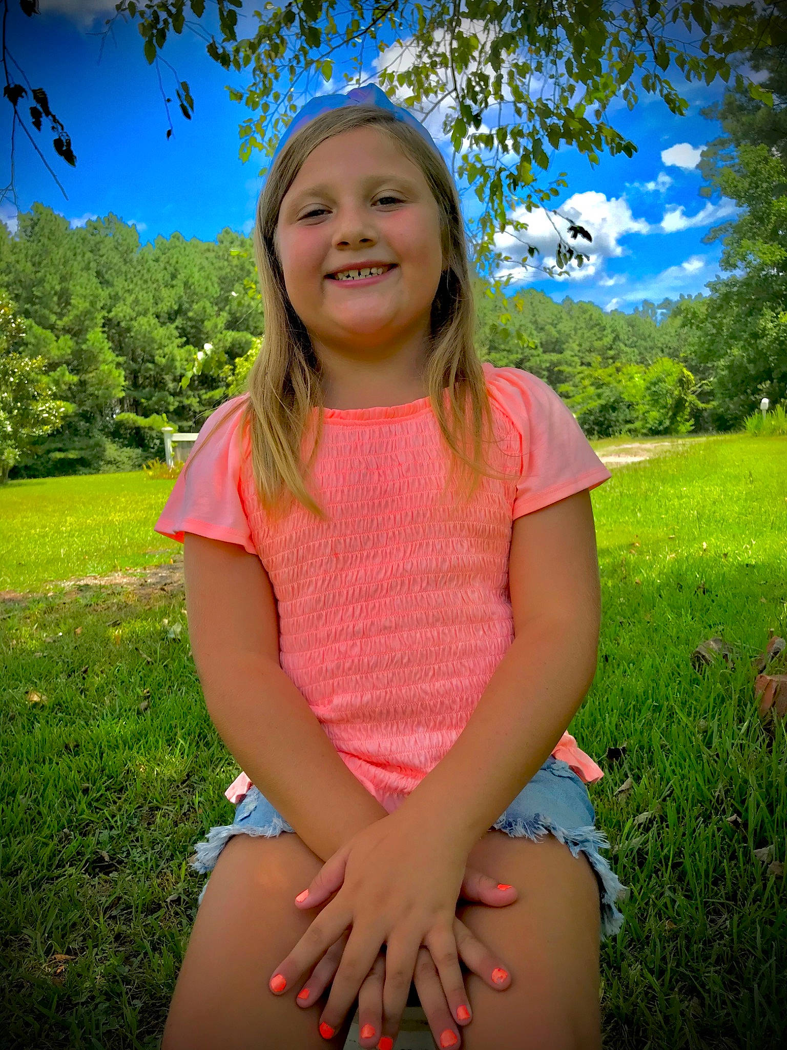 Lesleigh is registered to the contest to win money with this photo: blue, dress, electric_blue, eye, flash_photography, fun, grass, grassland, green, happy, headwear, joy, leisure, magenta, meadow, people_in_nature, person, pink, plant, sky