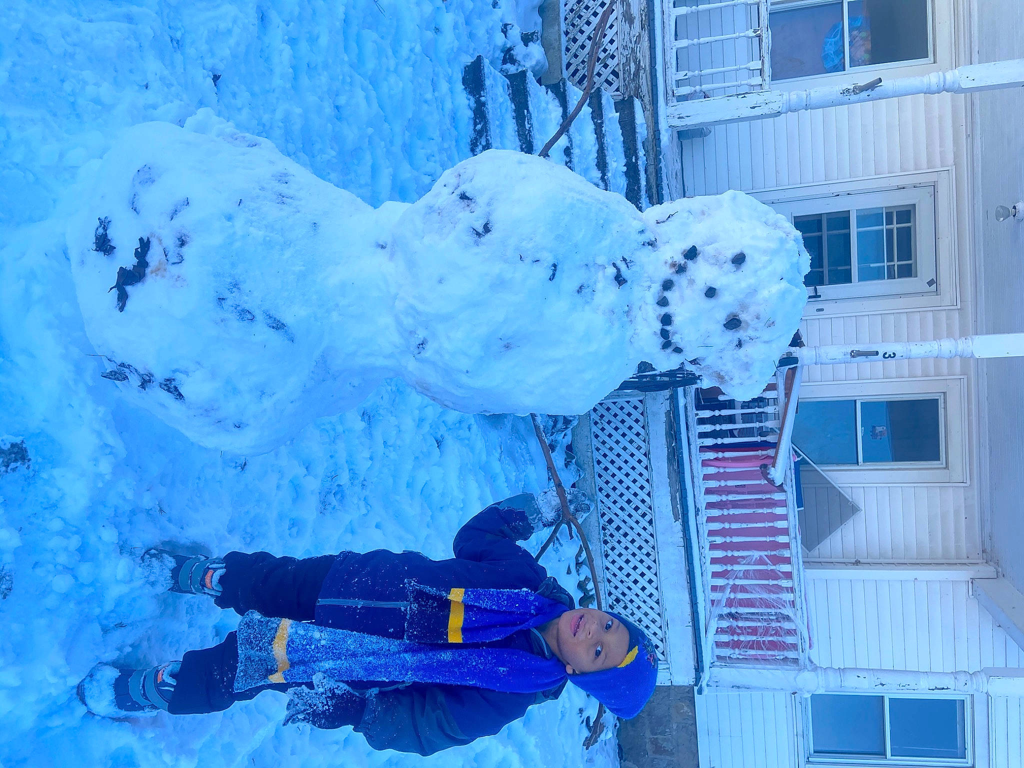 Kyler joined the competition — help win amazing prizes! blizzard, blue, freezing, frost, glove, headwear, home, ice, ice_cap, outdoor_shoe, person, playing_in_the_snow, precipitation, sculpture, snow, snowman, walking_shoe, winter, winter_storm