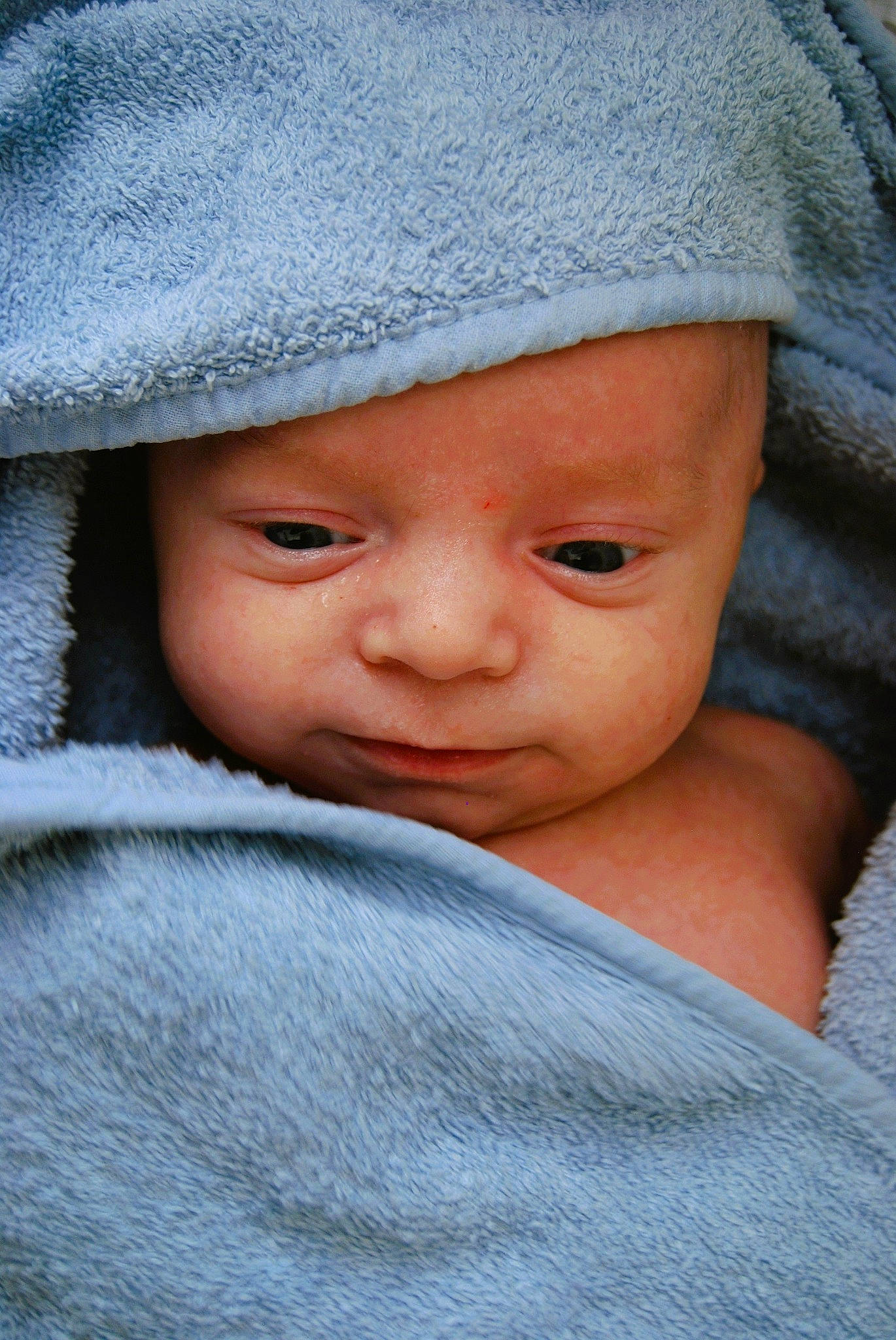 Tymeo participe au concours pour gagner de l'argent avec cette photo : baby, baby_toddler_clothing, cap, cheek, child, chin, close_up, comfort, eye, eyebrow, face, headwear, knit_cap, linens, lip, nose, outerwear, person, skin, sleeve