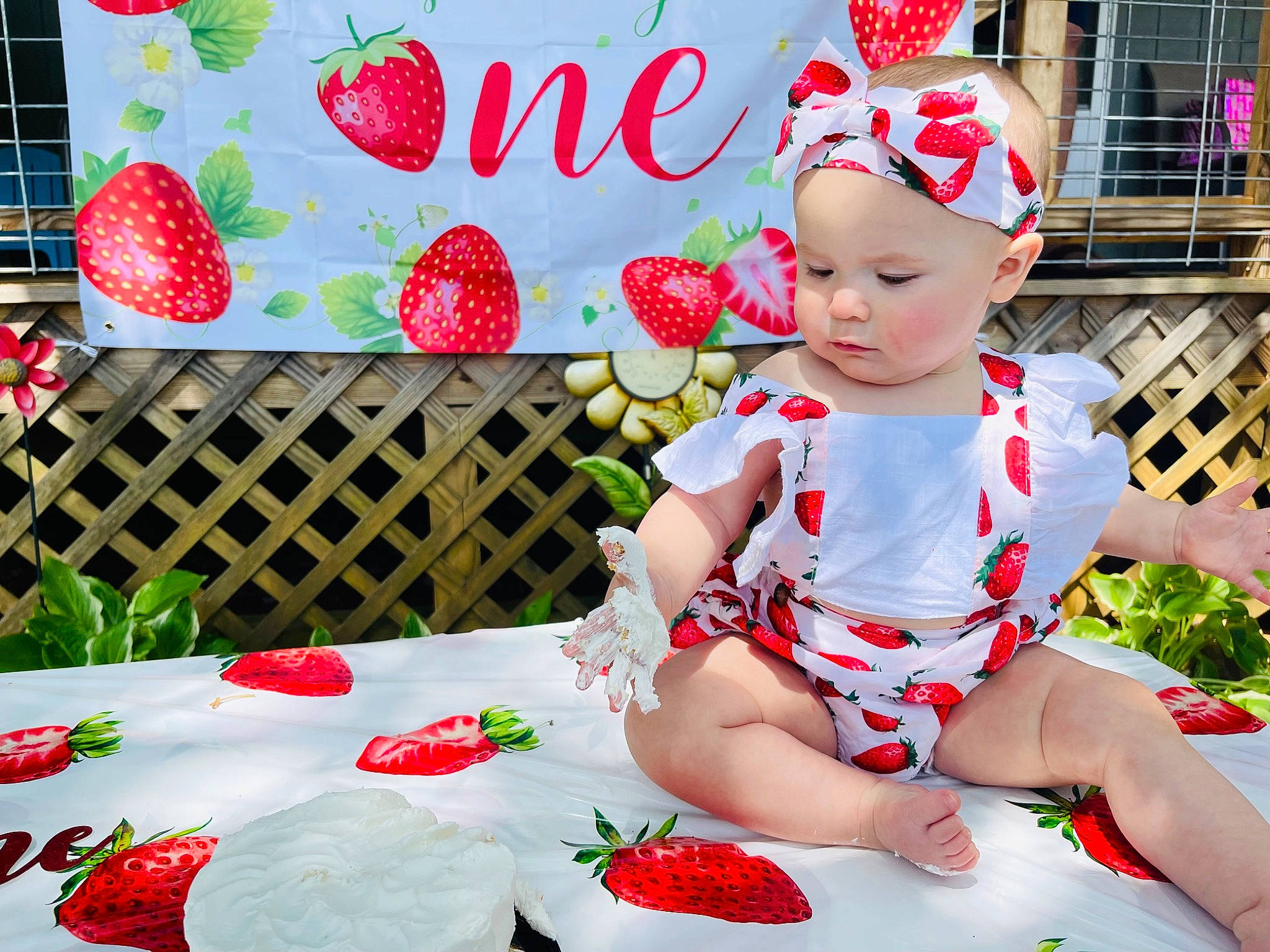 Charleigh joined the competition — help win amazing prizes! baby, baby_toddler_clothing, child, dress, event, face, fruit, green, happy, hat, head, headwear, leisure, natural_foods, pattern, person, pink, red, shorts, strawberry