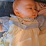 Harley joined the competition — help win amazing prizes! baby, infant, sleeping, couch, clothing, blue, yellow, face, head, child, portrait, soft_lighting, fabric, texture, indoors, person, cute, peaceful, resting, toddler