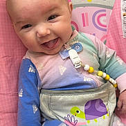 Presley joined the competition — help win amazing prizes! baby, smiling, onesie, adidas, pink, rainbow, animal_print, baby_seat, happy, tongue_out, infant, cute, clothing, child, playful, colorful, seat, indoors, face, hand