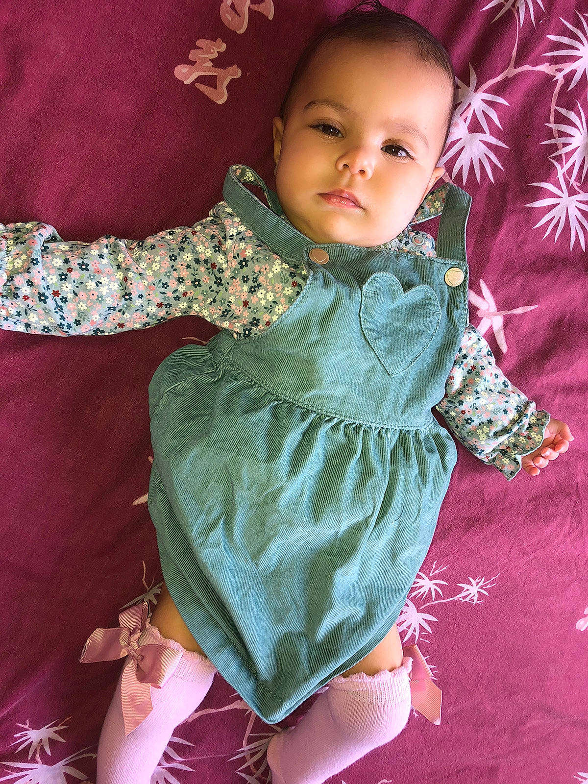 Tyana participe au concours pour gagner de l'argent avec cette photo : baby, baby_products, child, linens, pattern, person, pink, skin, smile, textile, toddler