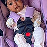 Aarya joined the competition — help win amazing prizes! baby, car_seat, child, comfort, cute, flower, headband, indoor, infant, mittens, newborn, person, portrait, purple, safety_harness, seat, soft, white_clothing, wide_eyes, young_child