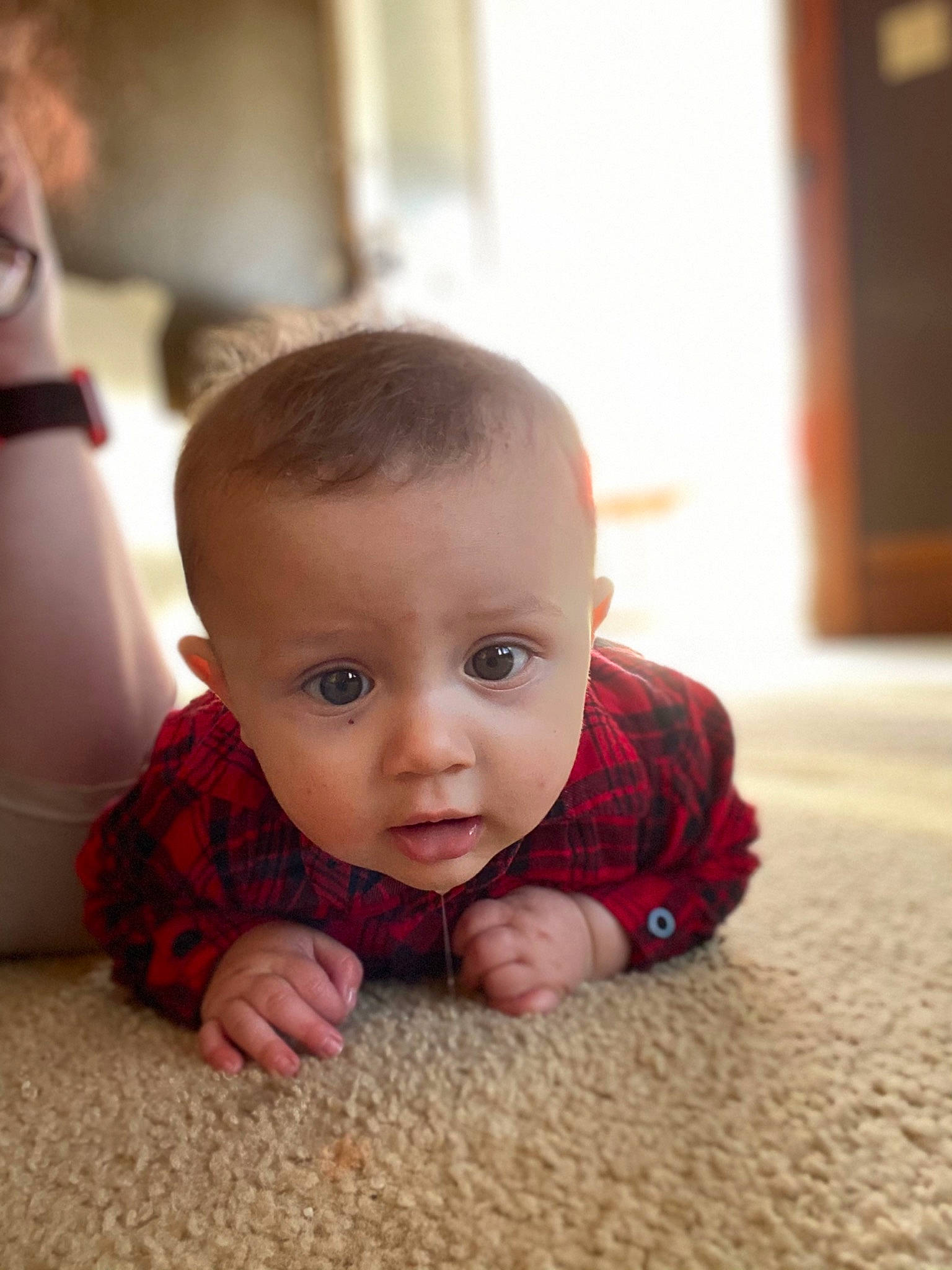 Elijah is registered to the contest to win money with this photo: baby, beauty, cheek, child, chin, crawling, eye, face, floor, flooring, head, lip, mouth, nose, person, room, sitting, skin, toddler, tummy_time