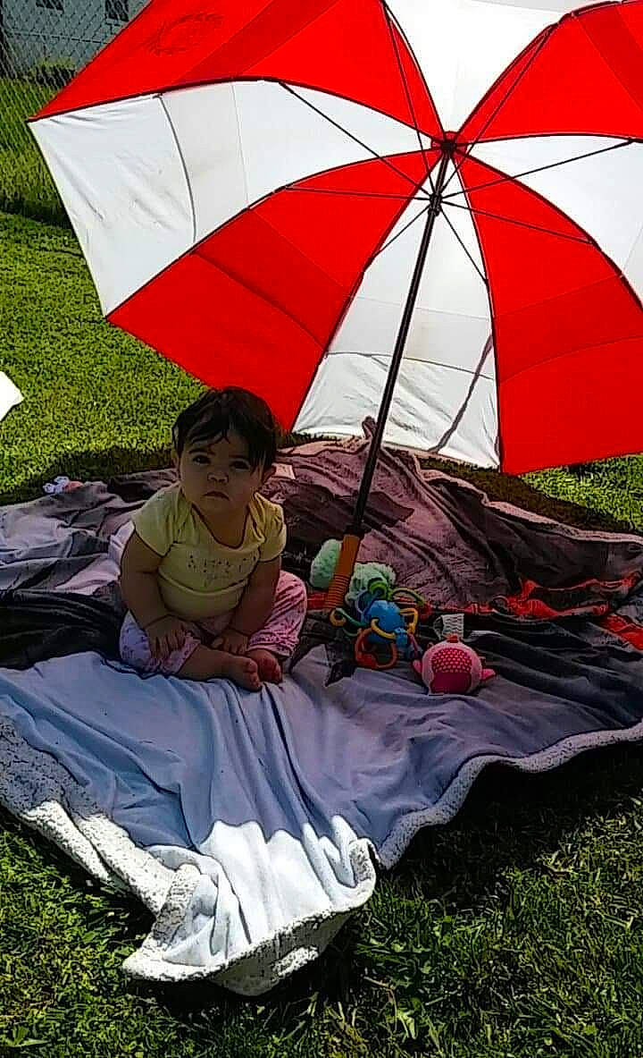 Kira joined the competition — help win amazing prizes! fashion_accessory, leisure, person, tent, umbrella