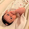 Manuela joined the competition — help win amazing prizes! baby, infant, child, onesie, blanket, lying_down, thumb_sucking, blue_eyes, pink_bow, cute, soft_lighting, indoor, portrait, face, head, skin, sleepwear, comfort, cozy, closeup