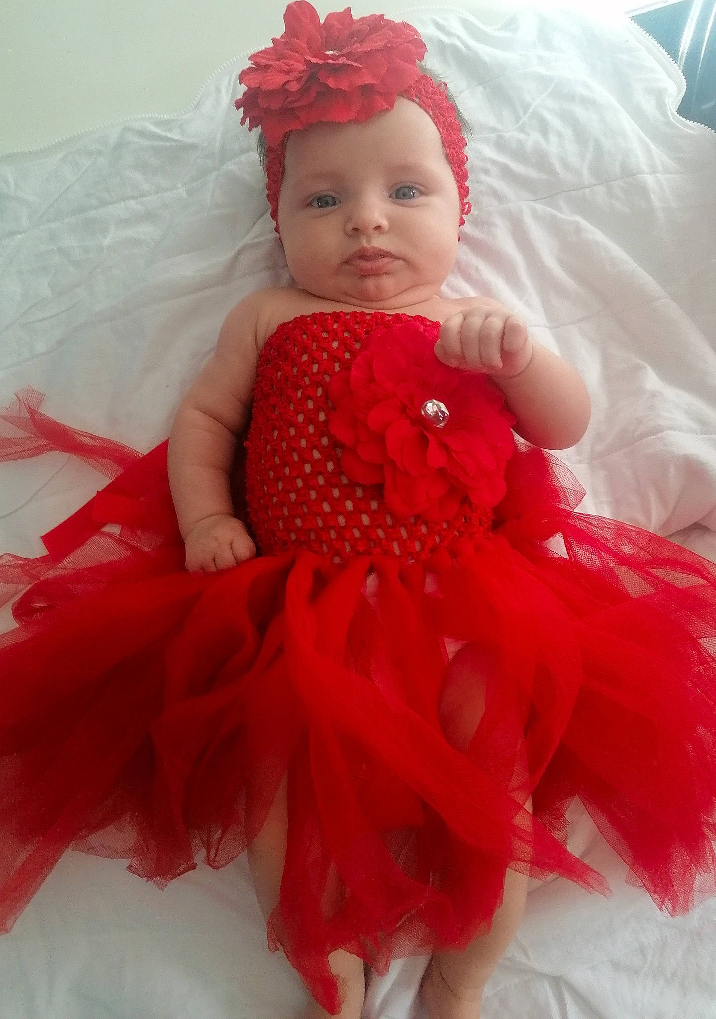 Lola a rejoint le concours — aidez-le/la à gagner de superbes lots ! baby, baby_toddler_clothing, ballet_tutu, child, clothing, costume, costume_accessory, doll, dress, hair_accessory, headpiece, headwear, person, pink, red, smile, toddler