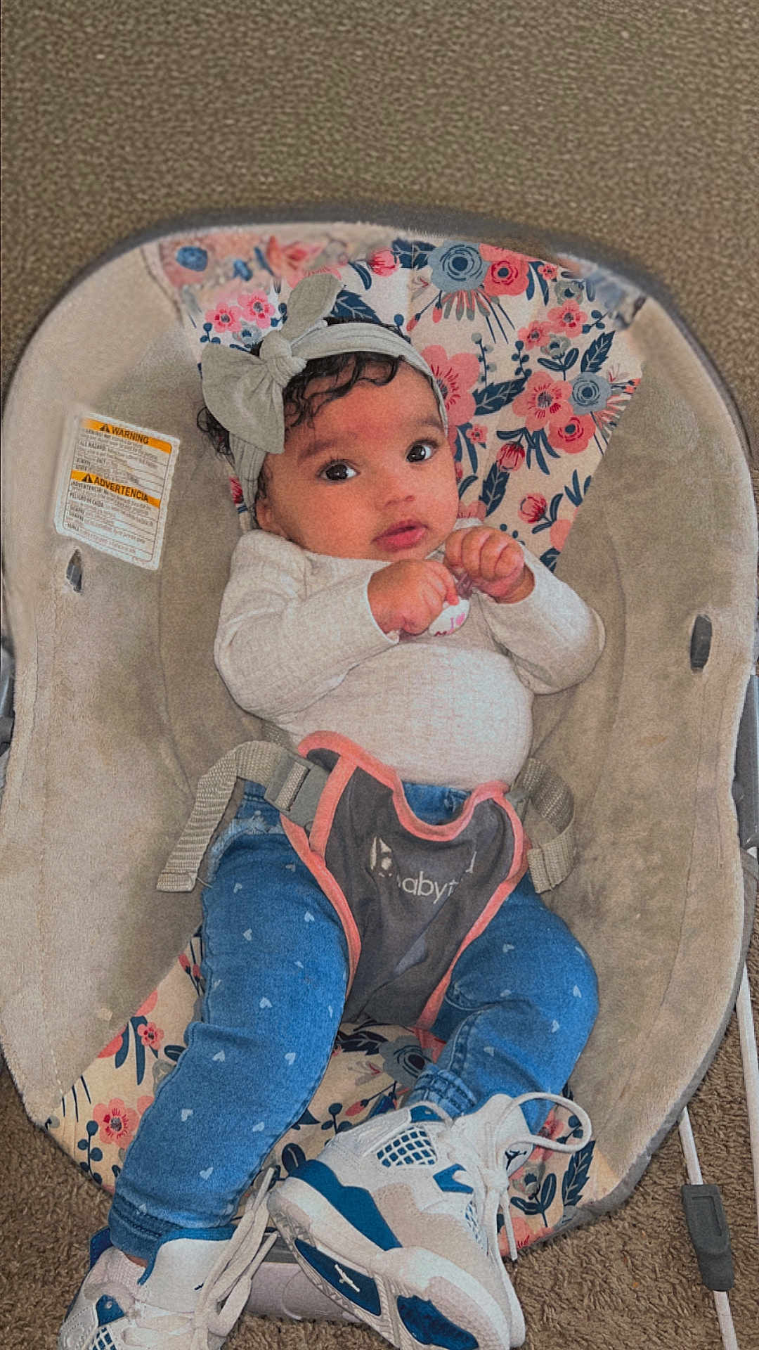 Meilani joined the competition — help win amazing prizes! baby, bonnet, cap, clothing, couch, face, footwear, furniture, hat, head, jeans, pants, person, photography, portrait, runningshoe, shoe, sneaker, transportation, vehicle