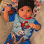 Meilani joined the competition — help win amazing prizes! baby, bodypart, cap, chair, clothing, couch, cushion, cutlery, face, finger, furniture, hat, head, homedecor, pants, person, photography, portrait, spoon, t_shirt