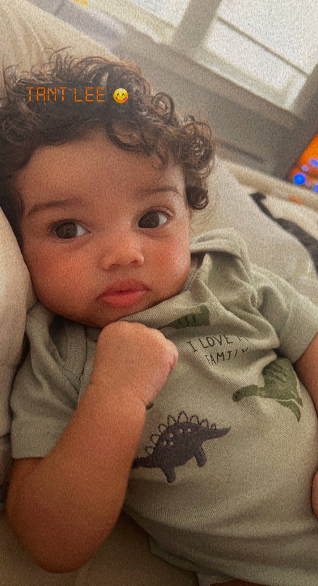 Joziah is registered to the contest to win money with this photo: arm, baby, baby_toddler_clothing, cheek, child, comfort, eye, eyebrow, finger, forehead, happy, iris, linens, lip, nail, nose, person, skin, sleeve, thumb