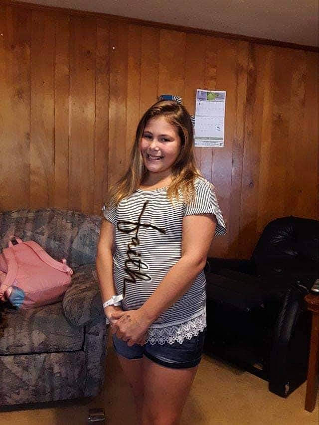 Emma joined the competition — help win amazing prizes! abdomen, backpack, bag, brown_hair, event, fashion_design, flash_photography, fun, happy, human_leg, joint, joy, knee, luggage_and_bags, person, shoulder, sitting, smile, thigh, trunk