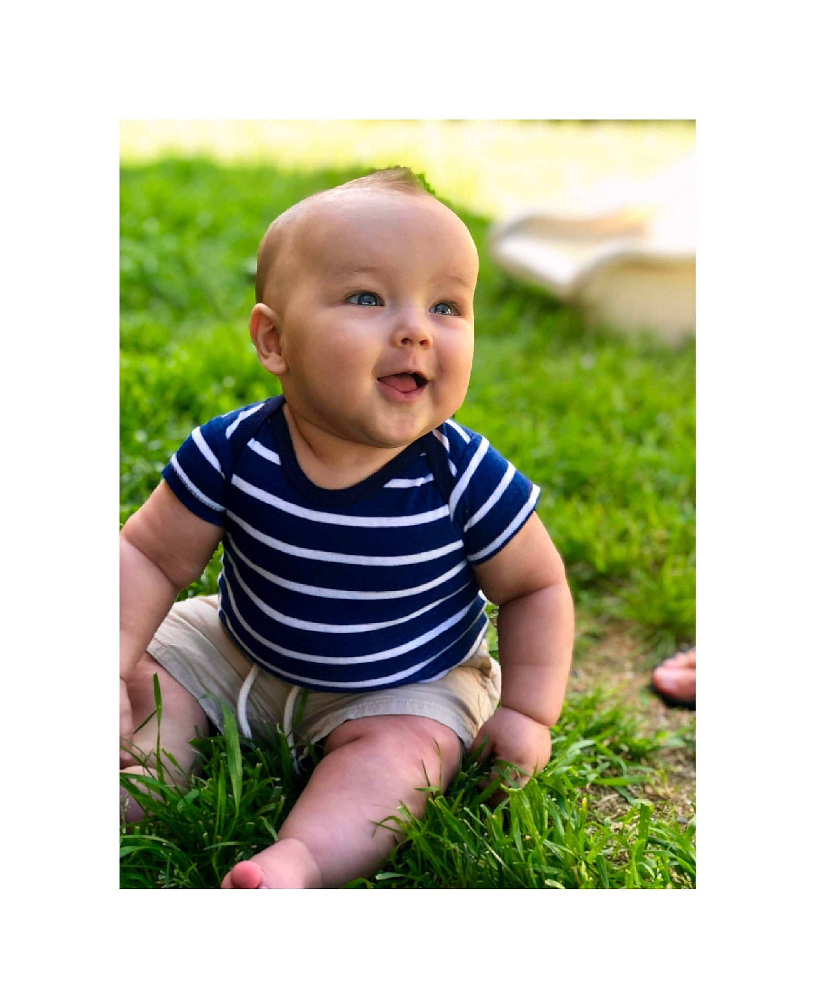 Kruz is registered to the contest to win money with this photo: baby, baby_toddler_clothing, child, grass, green, happy, lawn, people_in_nature, person, photograph, photography, plant, play, portrait, product, sitting, smile, stock_photography, summer, toddler