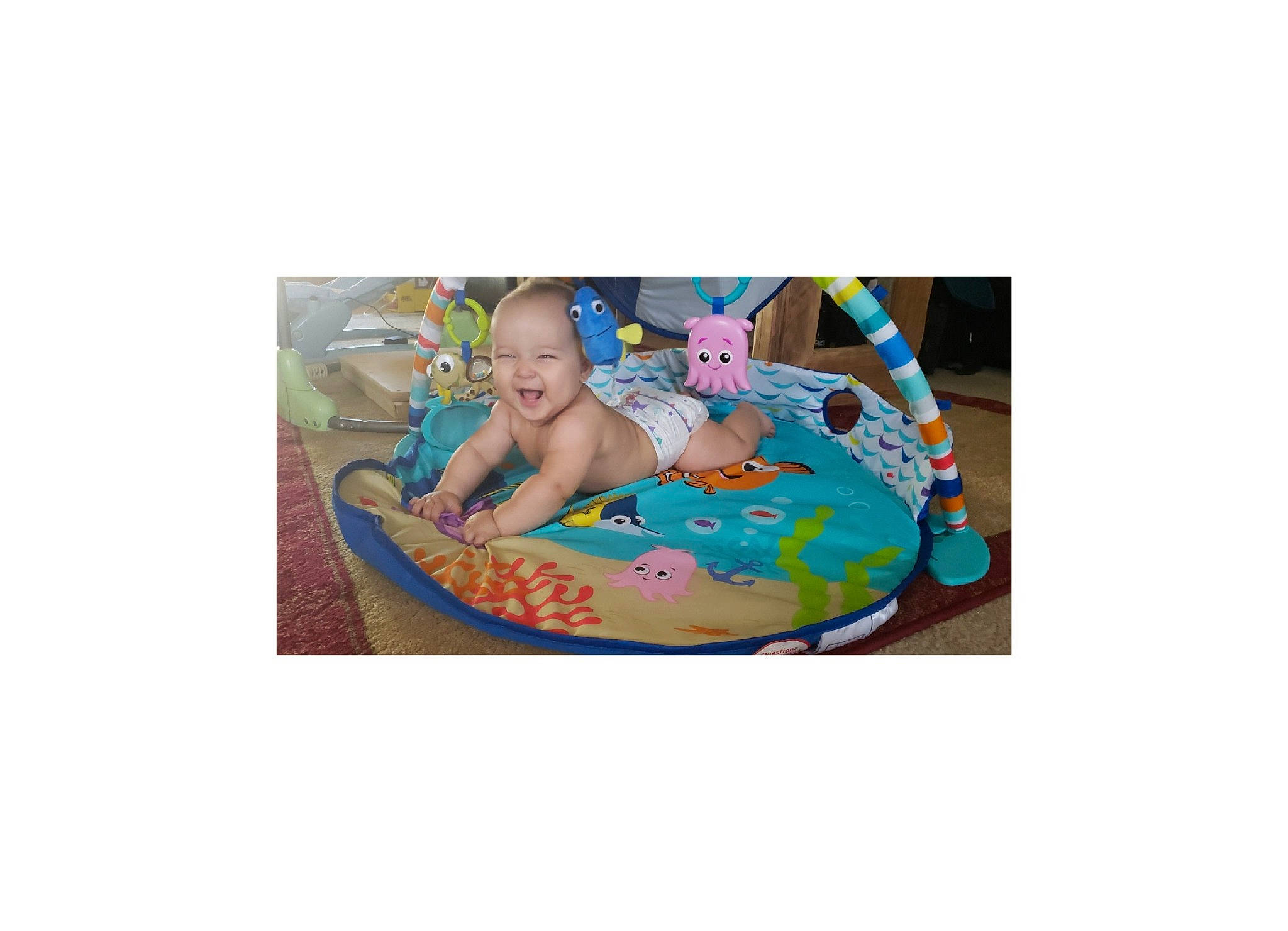Kruz is registered to the contest to win money with this photo: aqua, baby, baby_products, child, fictional_character, games, inflatable, person, play, product, recreation, toddler, turquoise